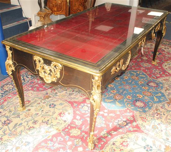 An early Louis XV brass inlaid ebony veneered bureau plat, W.6ft 6in. H.2ft 7.5in.